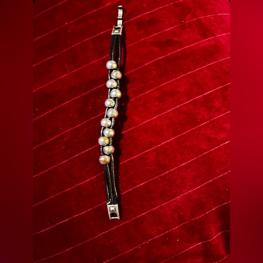 Leather corded and Silvertoned Beaded Bracelet.